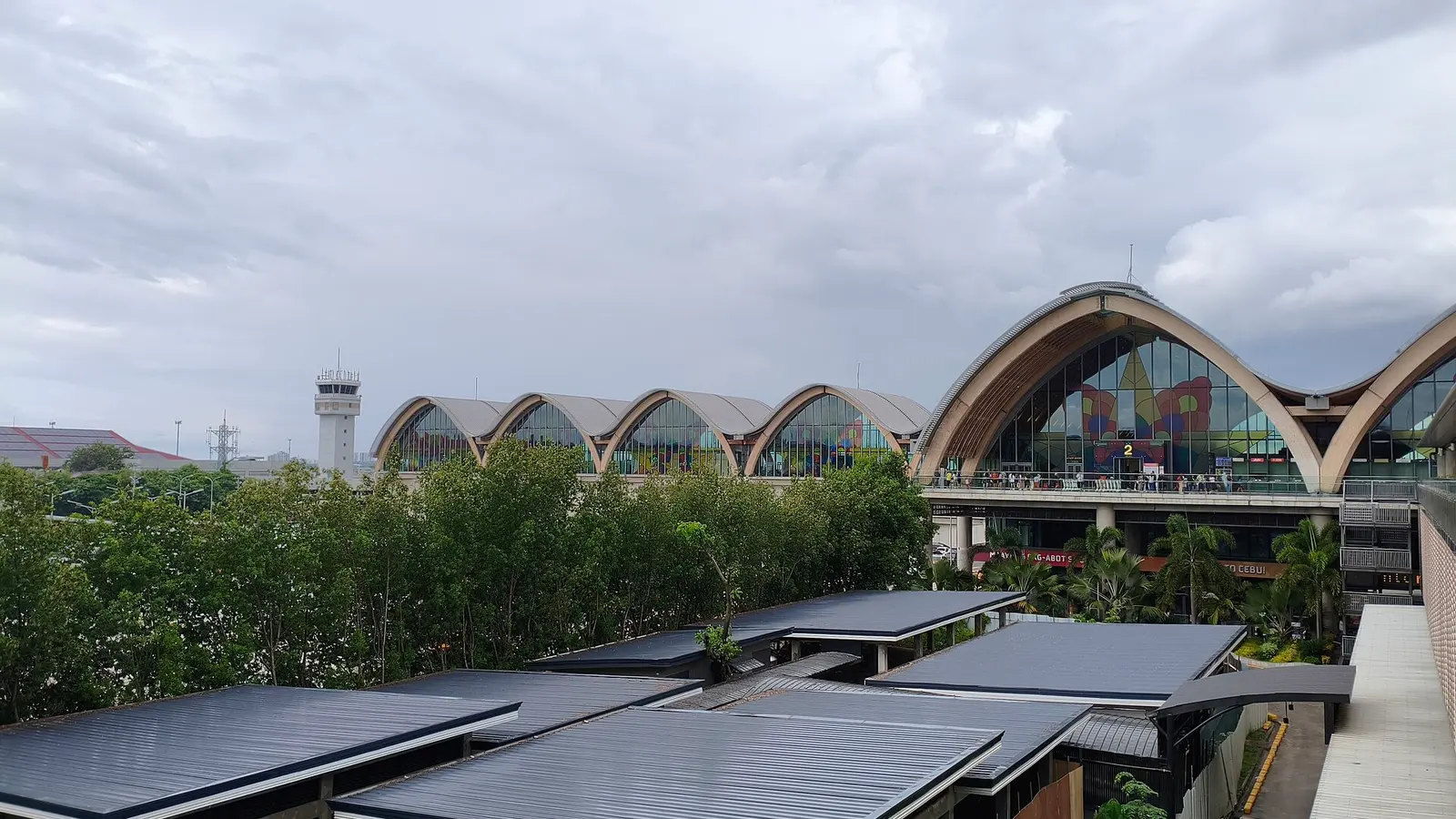 The departures entrance at Mactan-Cebu International Airport, where returning travellers are dropped off for their flight home
