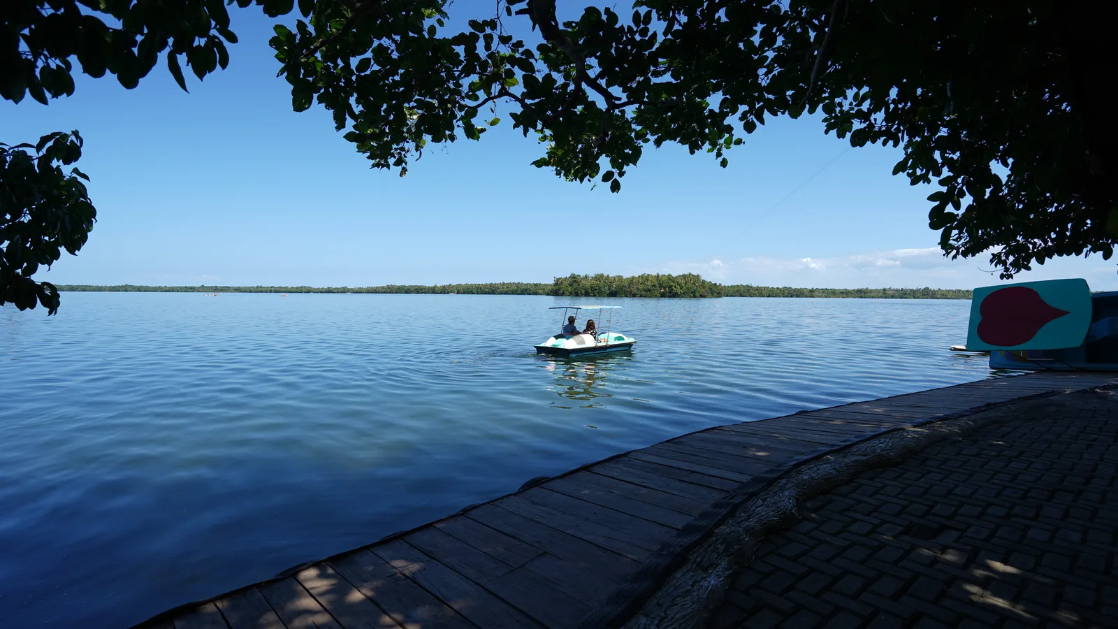 Photo: choypictures / CC0, via Wikimedia Commons The still, forest-ringed water of Lake Danao on the Camotes Islands, Cebu