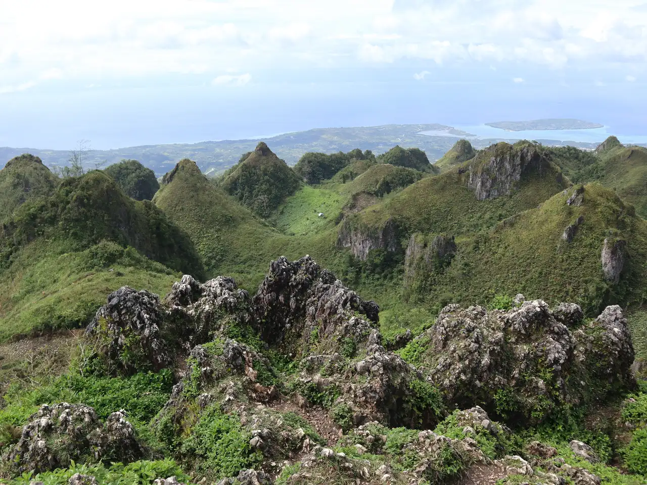 The rolling karst hills around Osmeña Peak in Dalaguete, Cebu