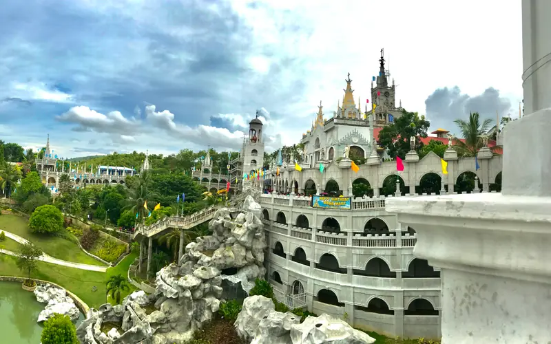 The castle-like Simala Shrine (Monastery of the Holy Eucharist) and its gardens in Sibonga, Cebu