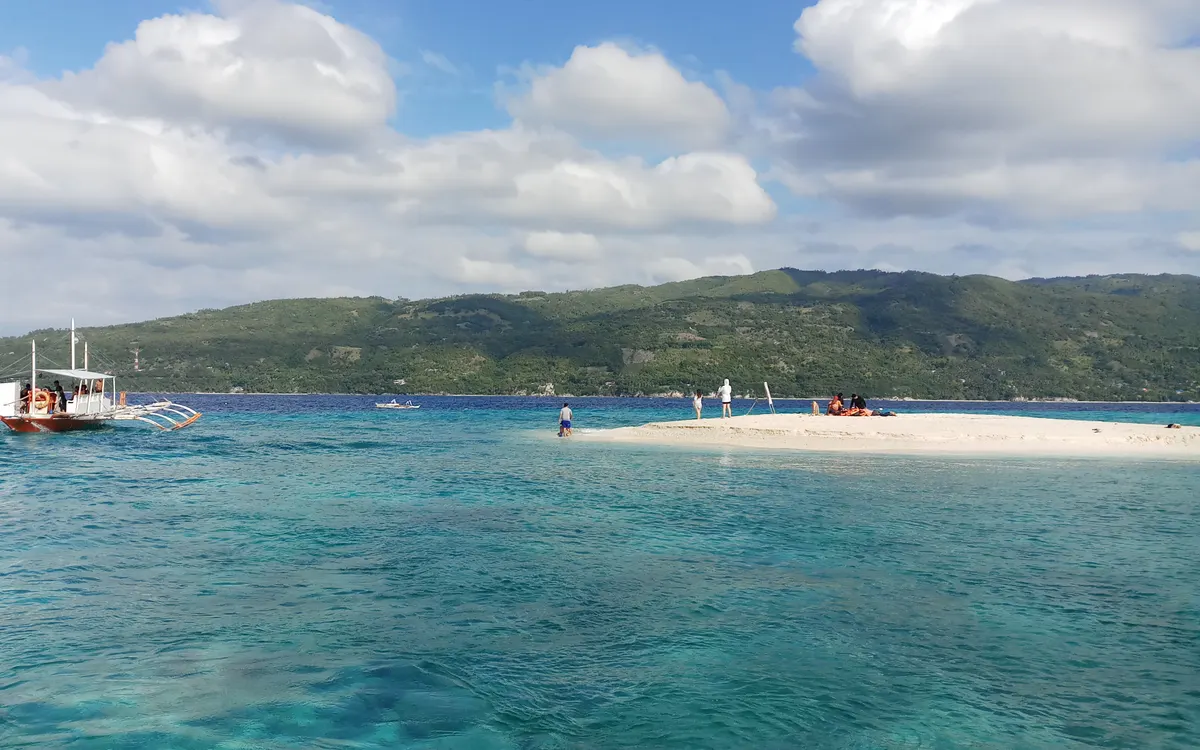 The shifting white sandbar of Sumilon Island off Oslob, Cebu
